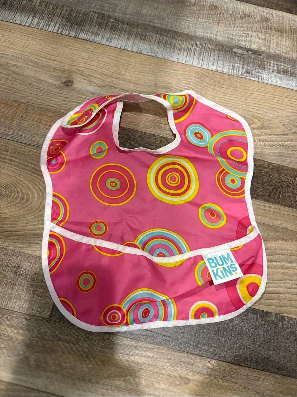 Bumkins Pink Multicolor Target-Print Waterproof Kids Bib